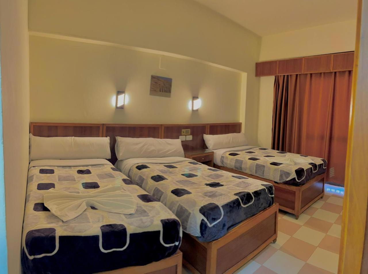 Merry Land Hotel & Roof Top Nile Restaurant Луксор Экстерьер фото